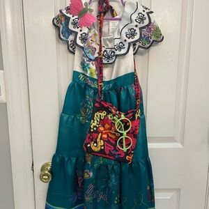 mirabel dress from encanto with purse and glasses
